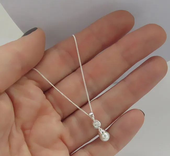 Cubic Zirconia and White Pearl Pendant