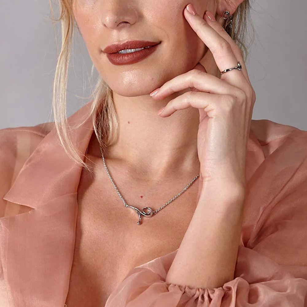 Q pendant on side