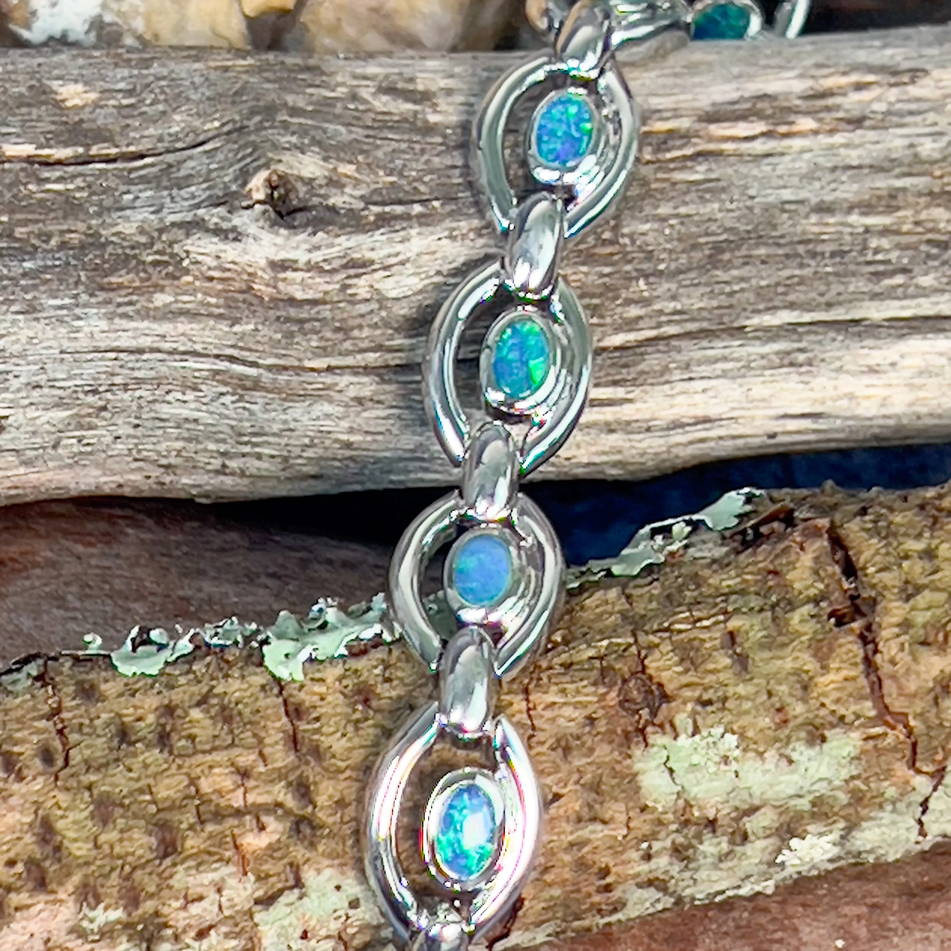 Sterling Silver oval shape framed bracelet with opal doublet