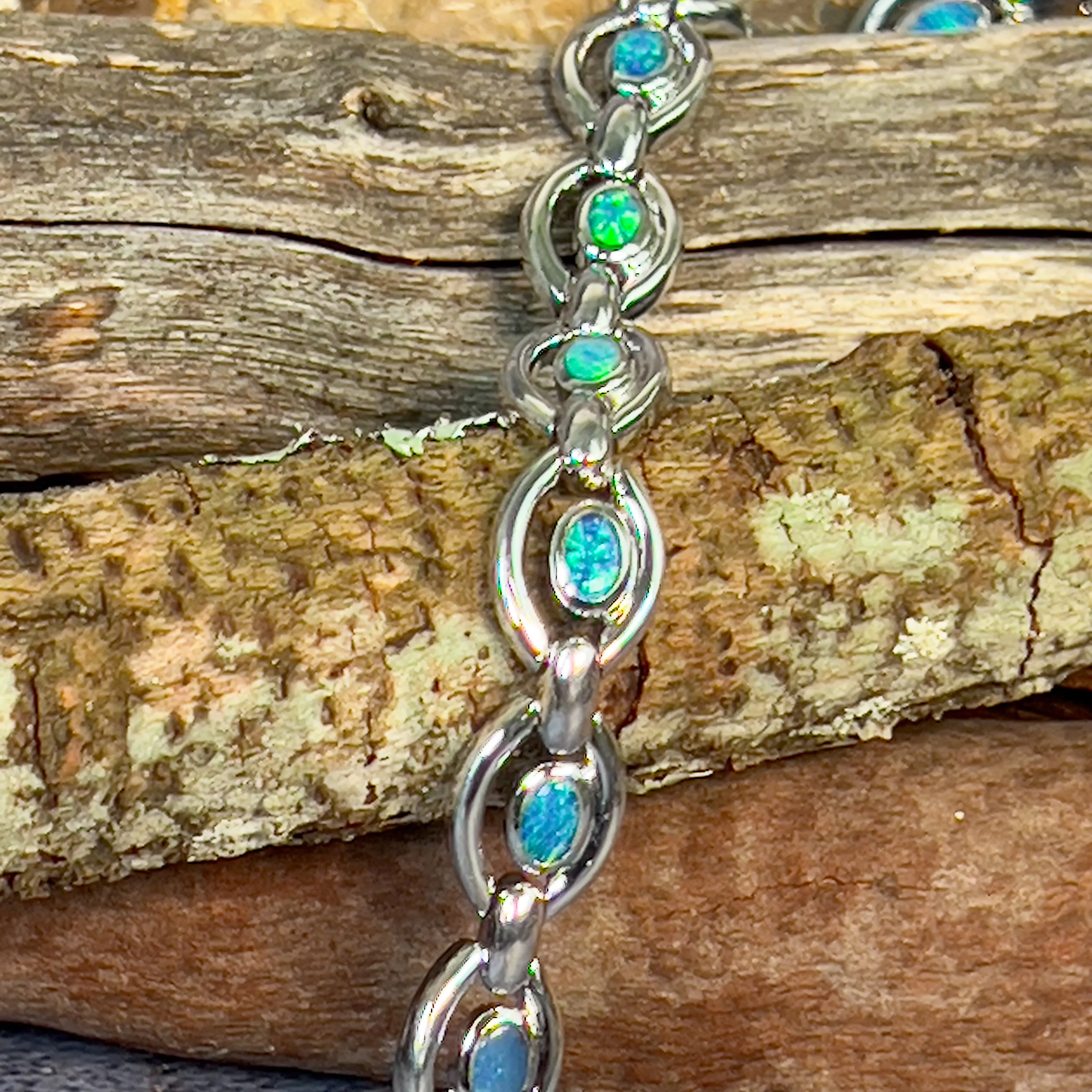 Sterling Silver oval shape framed bracelet with opal doublet